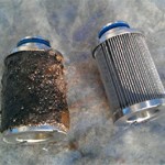 image of a contaminated and a clean fuel filter
